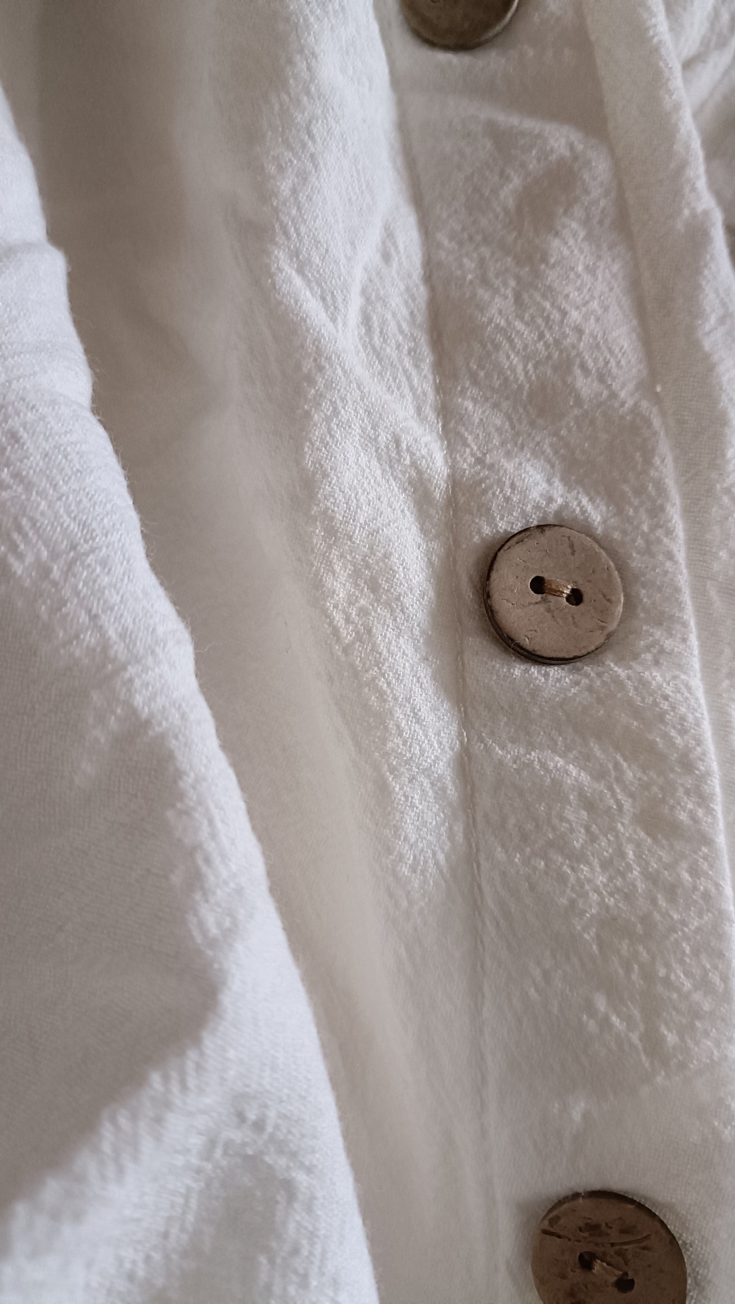 White Shirt with Asymmetric Button Detail