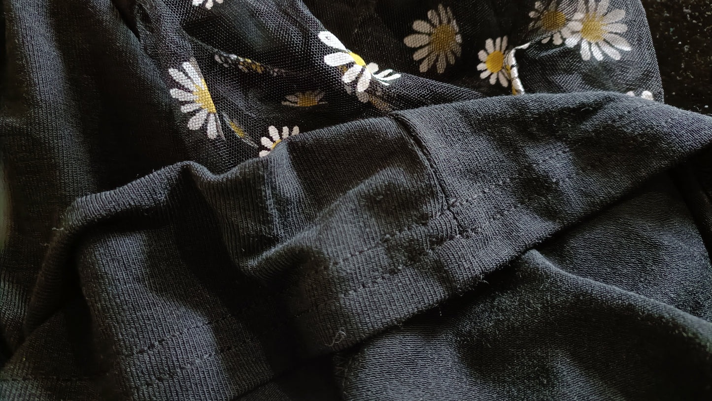 Black Top with Sheer Daisy Print Sleeves