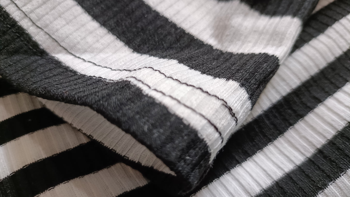 Long Sleeve Black and White Striped T Shirt with Star Motif
