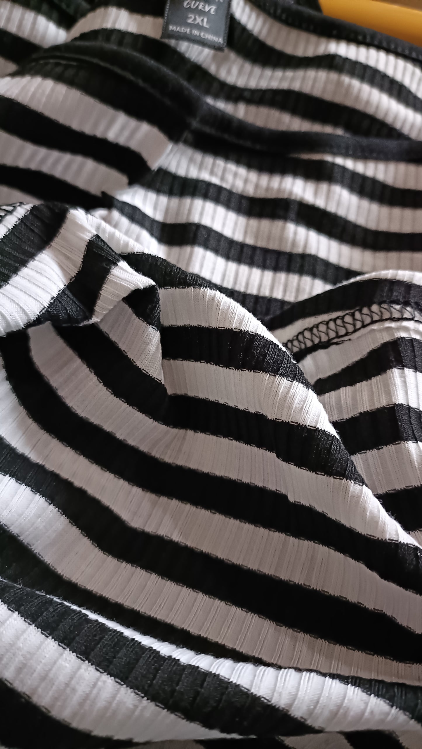 Long Sleeve Black and White Striped T Shirt with Star Motif