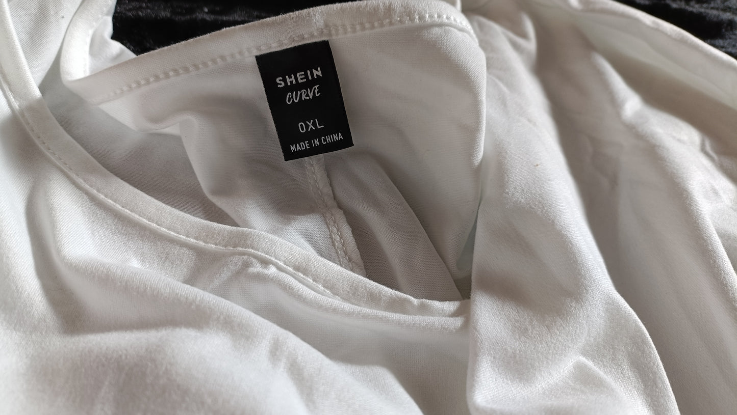 Off White/Cream Top with Tassel Trim on Sleeves and Hemline
