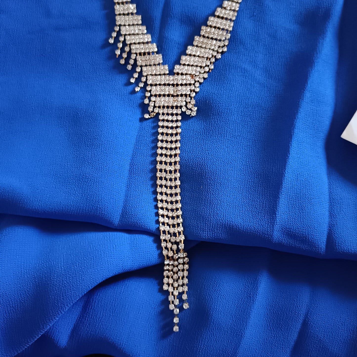 Blue Sleeveless Top with Necklace Detail