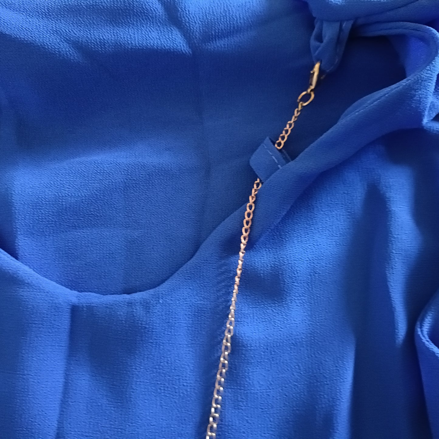 Blue Sleeveless Top with Necklace Detail