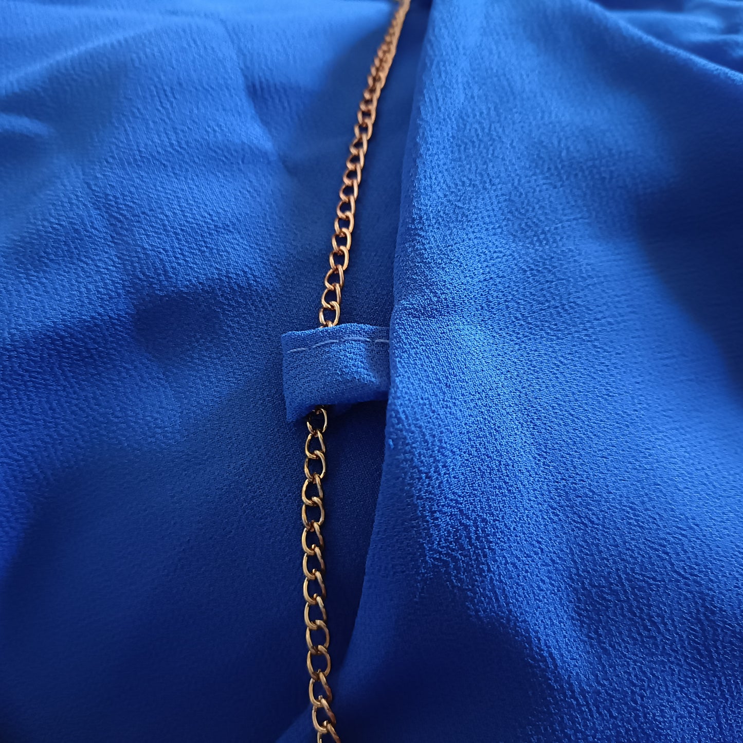 Blue Sleeveless Top with Necklace Detail