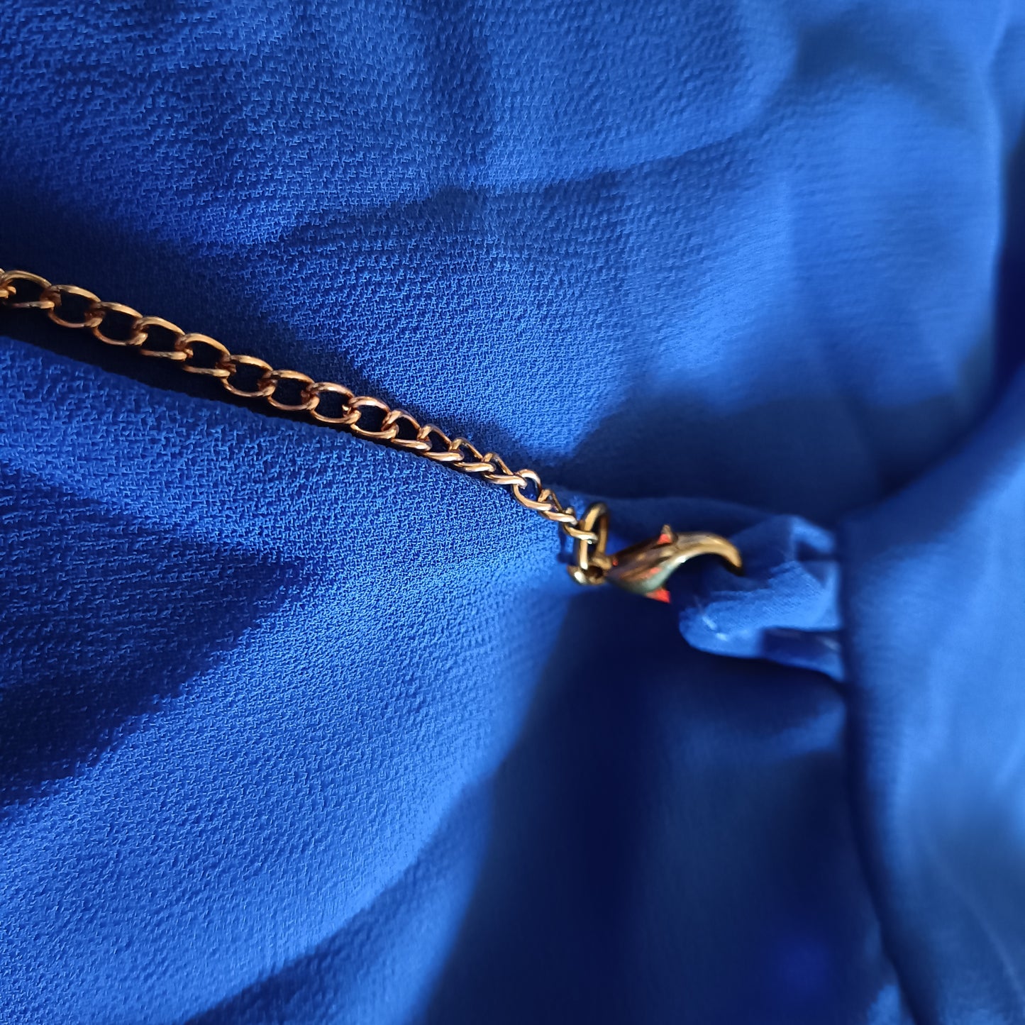 Blue Sleeveless Top with Necklace Detail