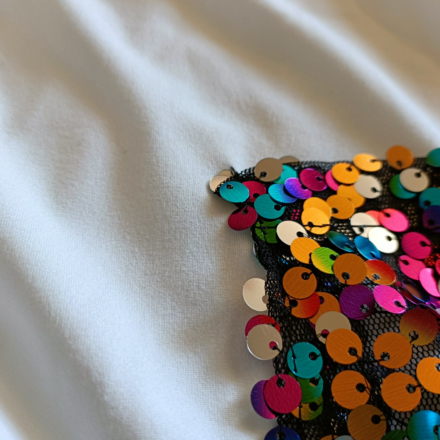 White T-Shirt with Multi Coloured Sequin Pocket Detail