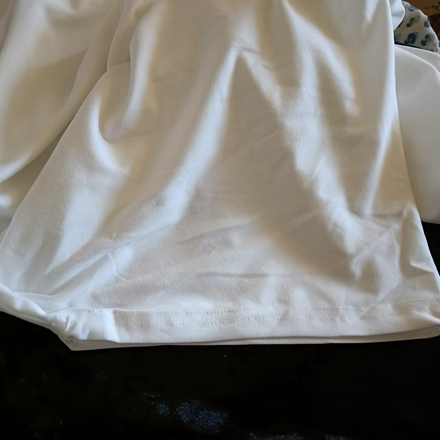 White T-Shirt with Multi Coloured Sequin Pocket Detail