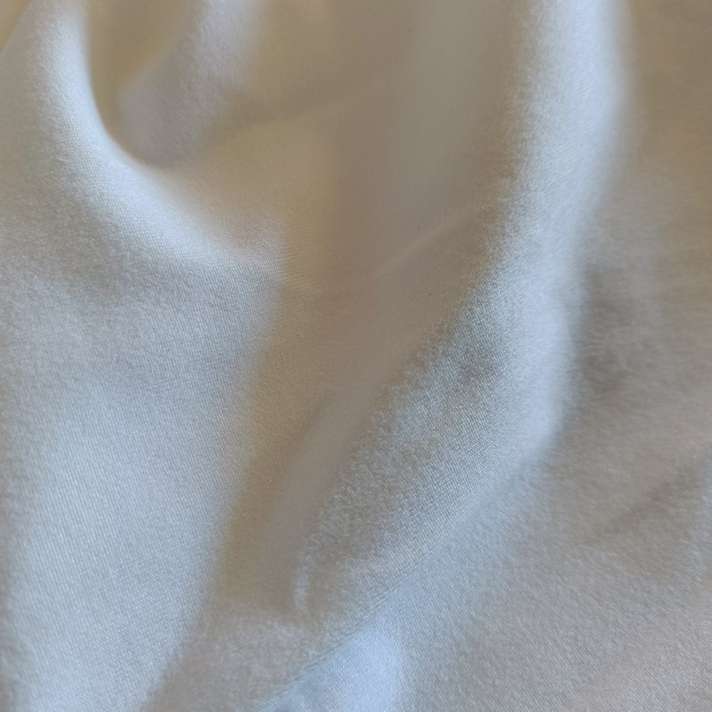 White T-Shirt with Multi Coloured Sequin Pocket Detail