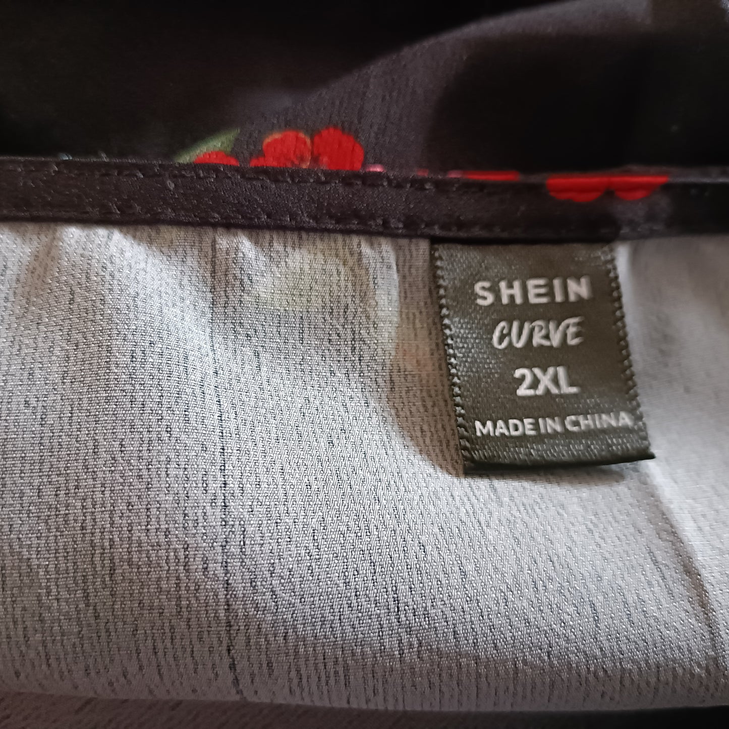 Black Wraparound Skirt with Floral Print and Frill Bottom