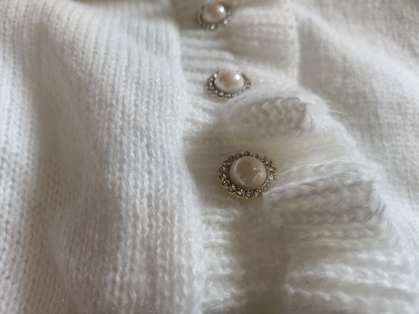 Off White Jumper with Ruffle Neck and Faux Pearl Button Detail