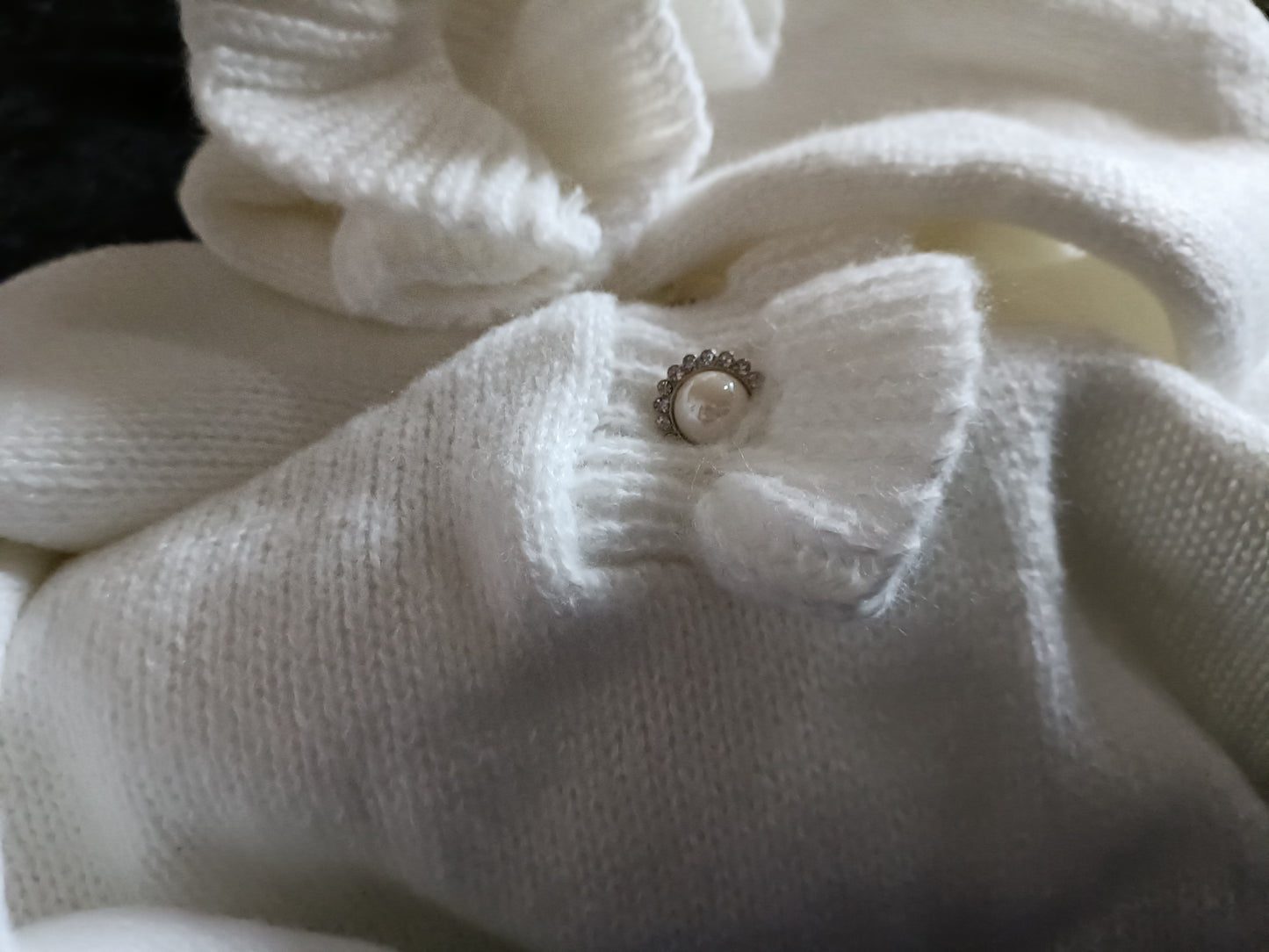 Off White Jumper with Ruffle Neck and Faux Pearl Button Detail