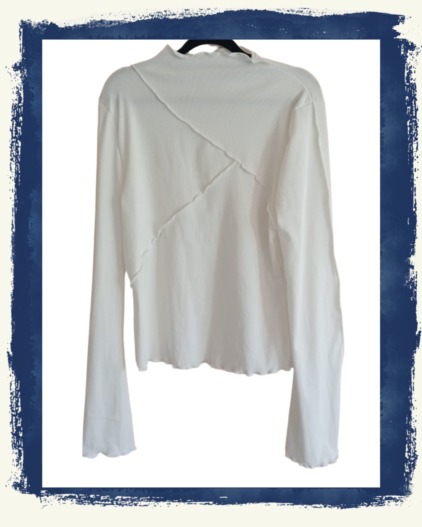 Cream Jumper with Outer Seam Detail, Ruffle Collar and Sleeves