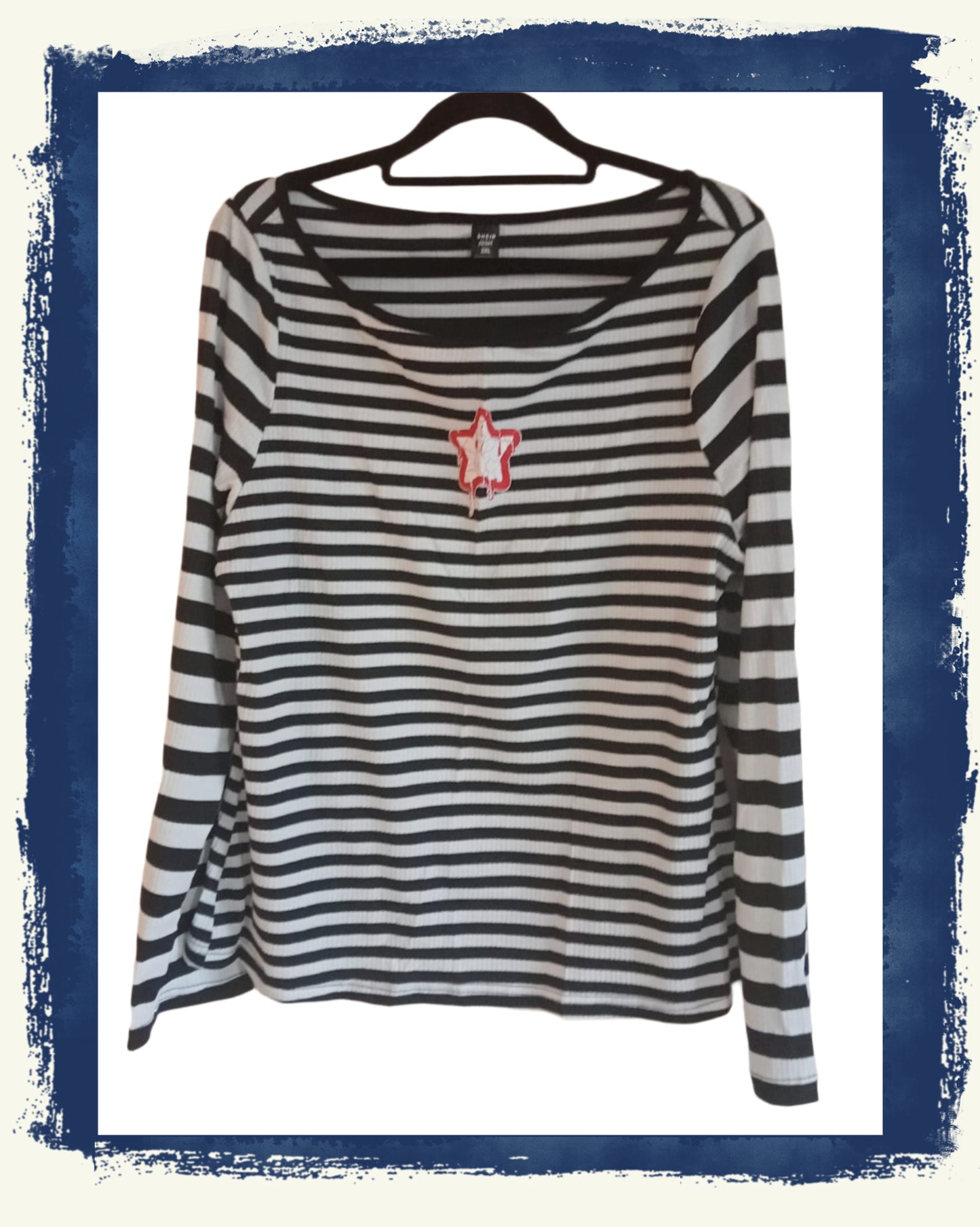 Long Sleeve Black and White Striped T Shirt with Star Motif