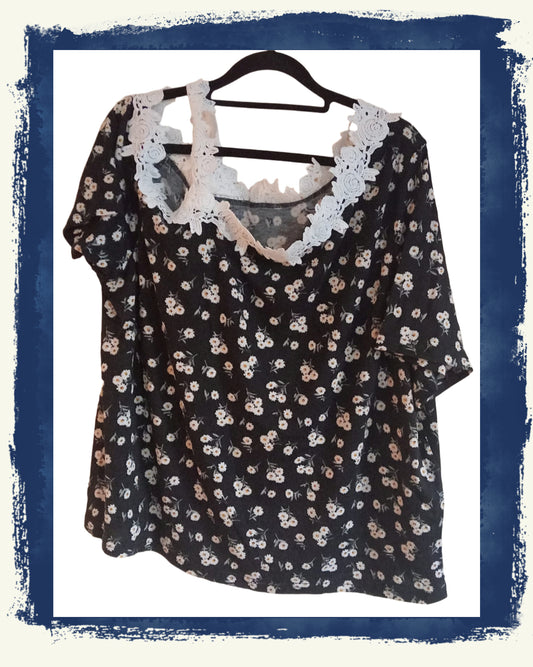 Black Daisy Print Asymmetrical Top with Lace Shoulder Strap and Neckline