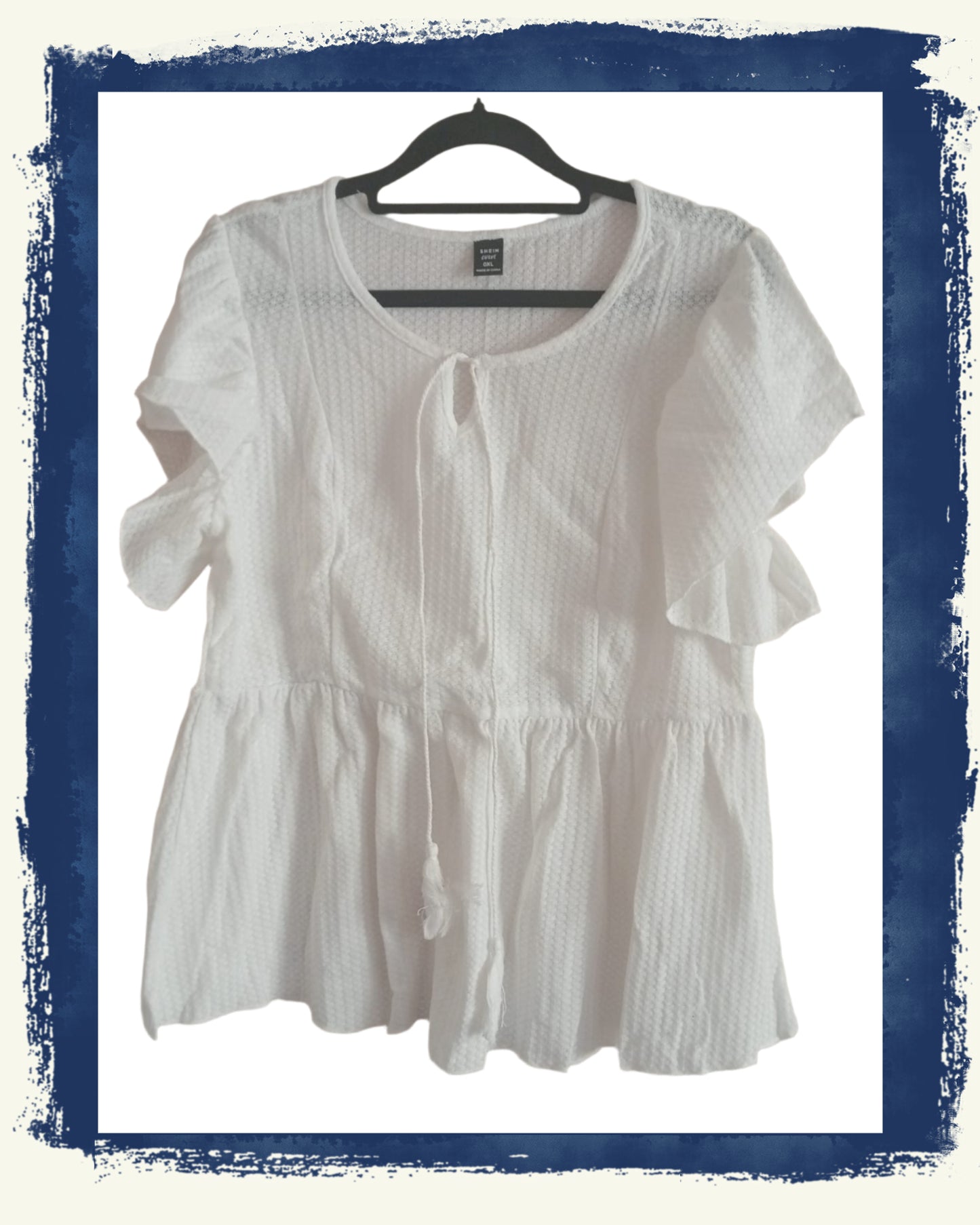 Cream Peplum Top with Tassel Tie Front Neckline