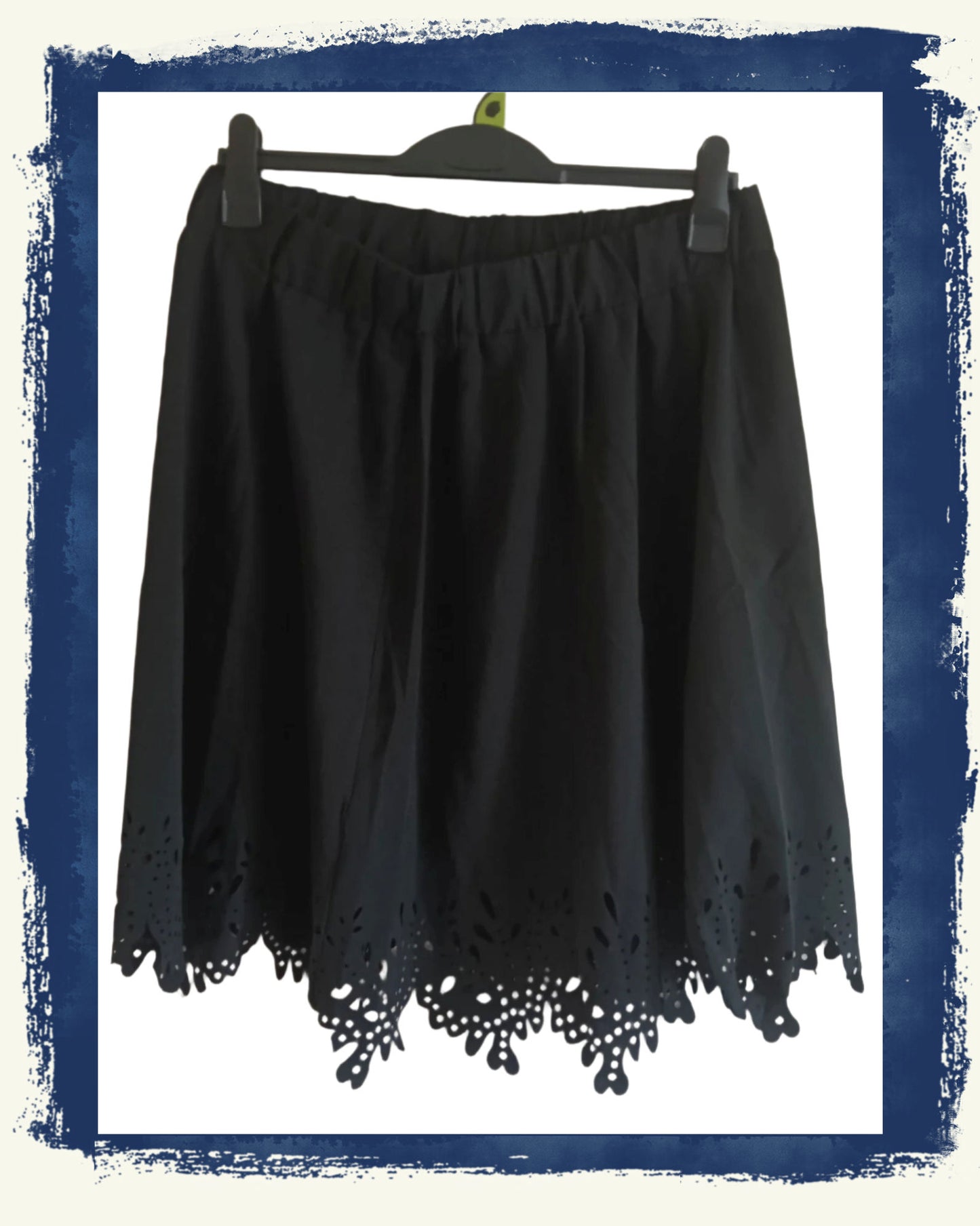 Black Skirt with Cut Out Hem