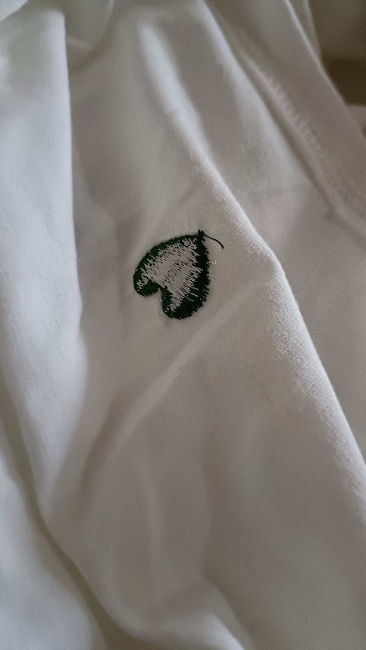 White T Shirt with Embroidered Green Hearts and Lace Trim