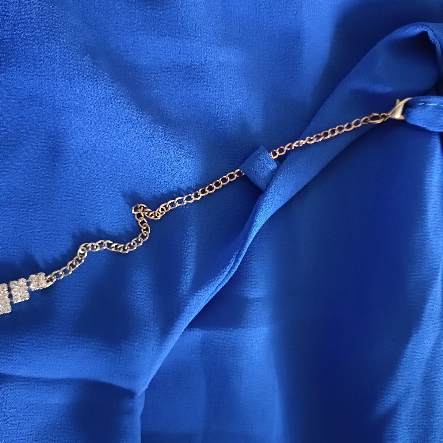 Blue Sleeveless Top with Necklace Detail