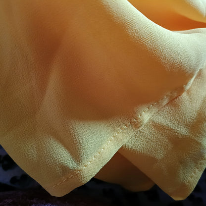 Vibrant Yellow Sleeveless Blouse