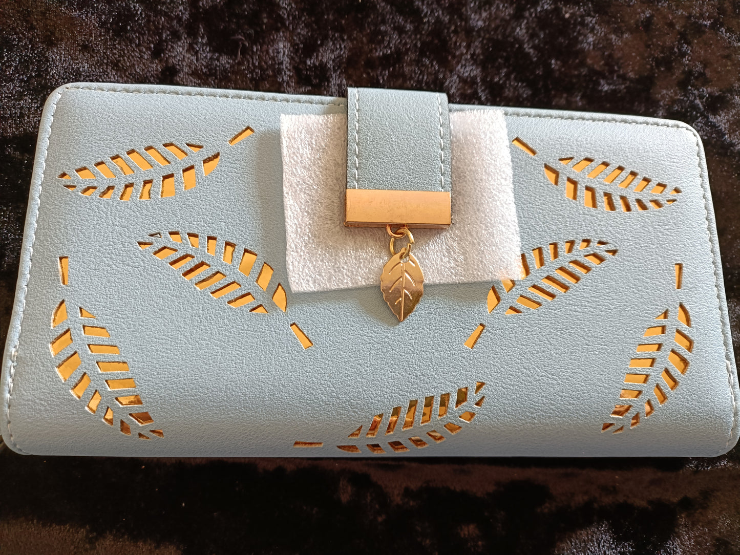 Large Blue Purse with Cut Out Leaf Design