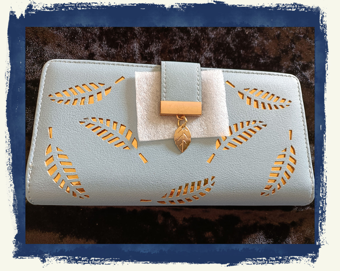 Large Blue Purse with Cut Out Leaf Design